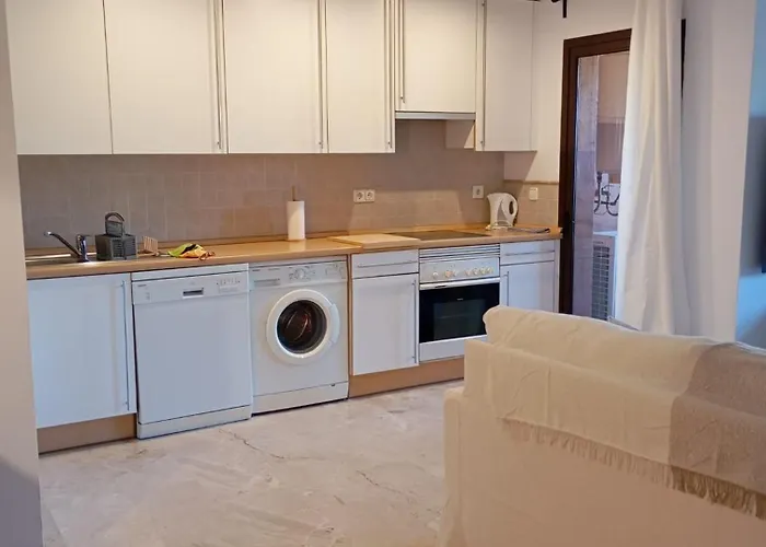 Aparthotel Costa Galera Con Piscinas Jardin Y Un Bano Cercano A La Playa